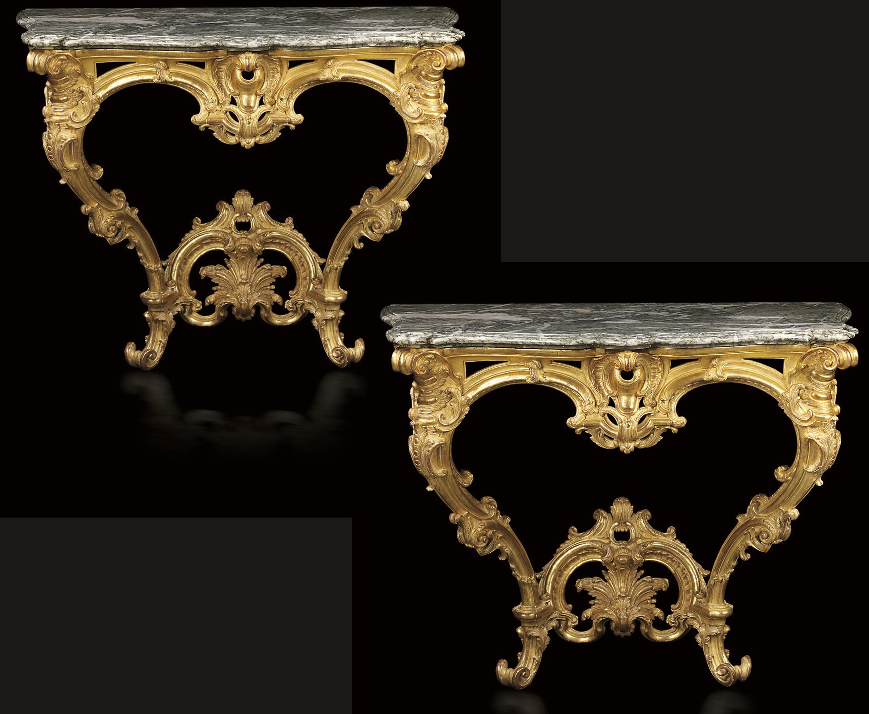 A MATCHED PAIR OF LOUIS XV GILTWOOD CONSOLES