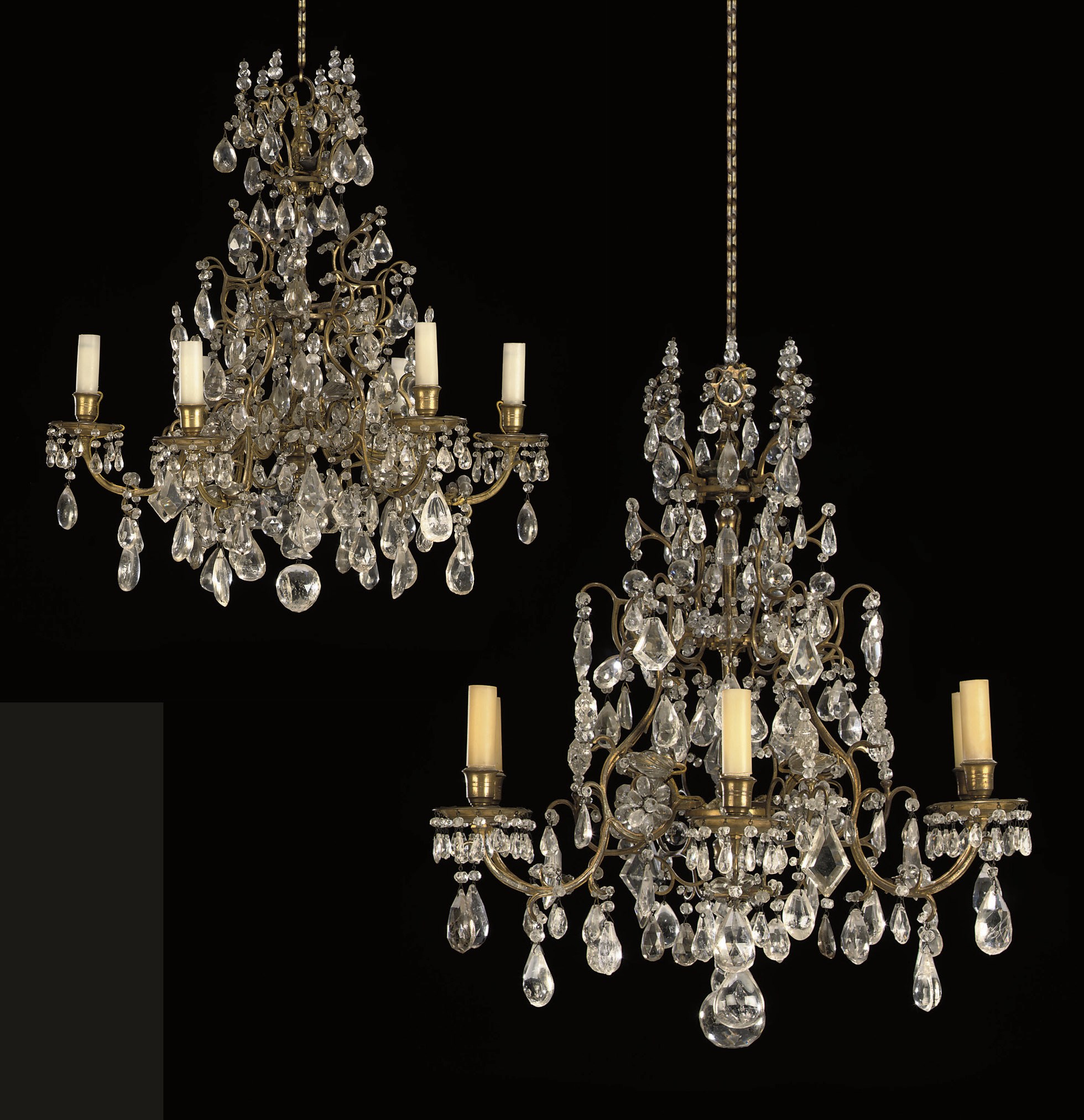 A PAIR OF FRENCH ORMOLU, ROCK CRYSTAL AND CUT-GLASS SIX-LIGHT CHANDELIERS