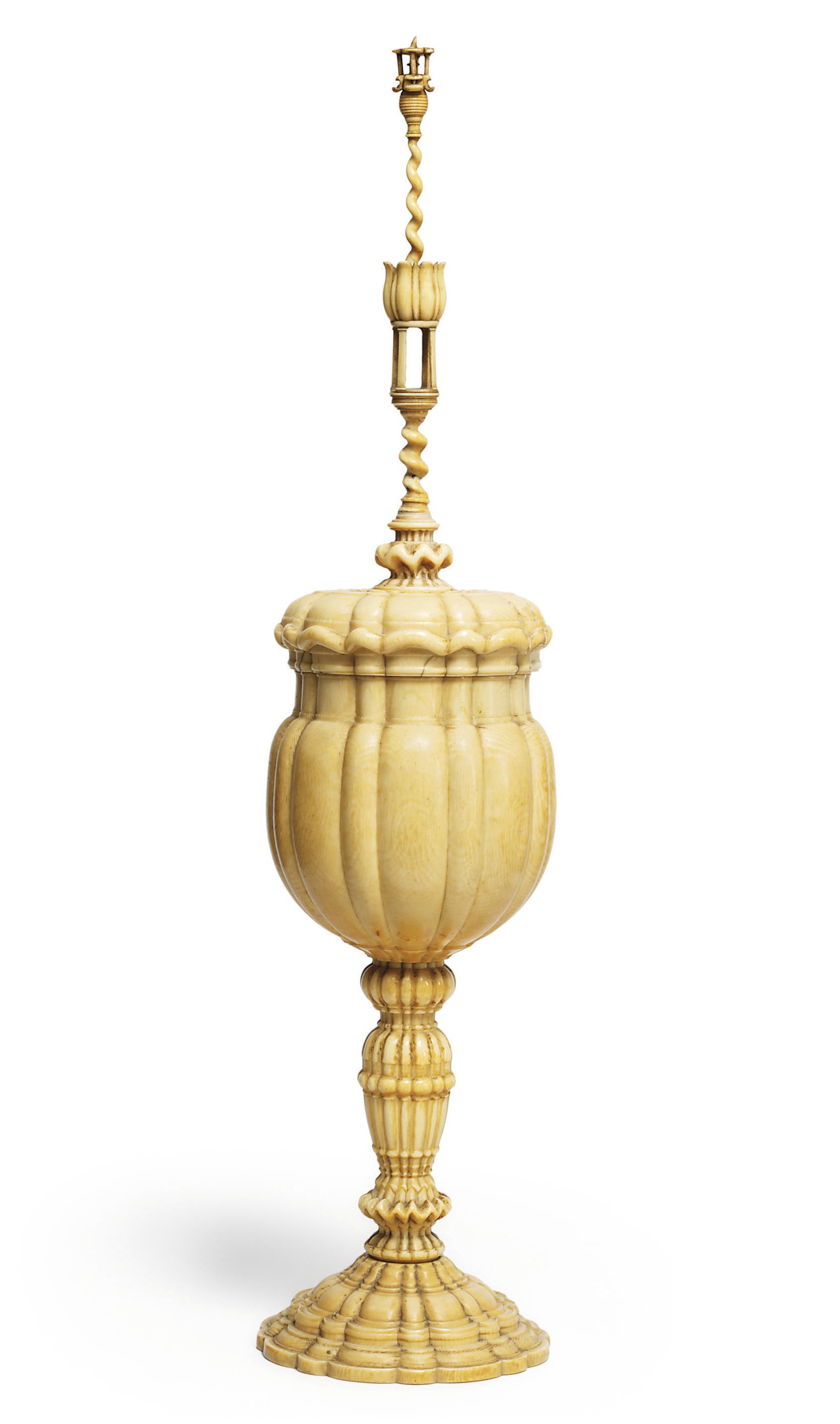 A CARVED IVORY CUP AND COVER