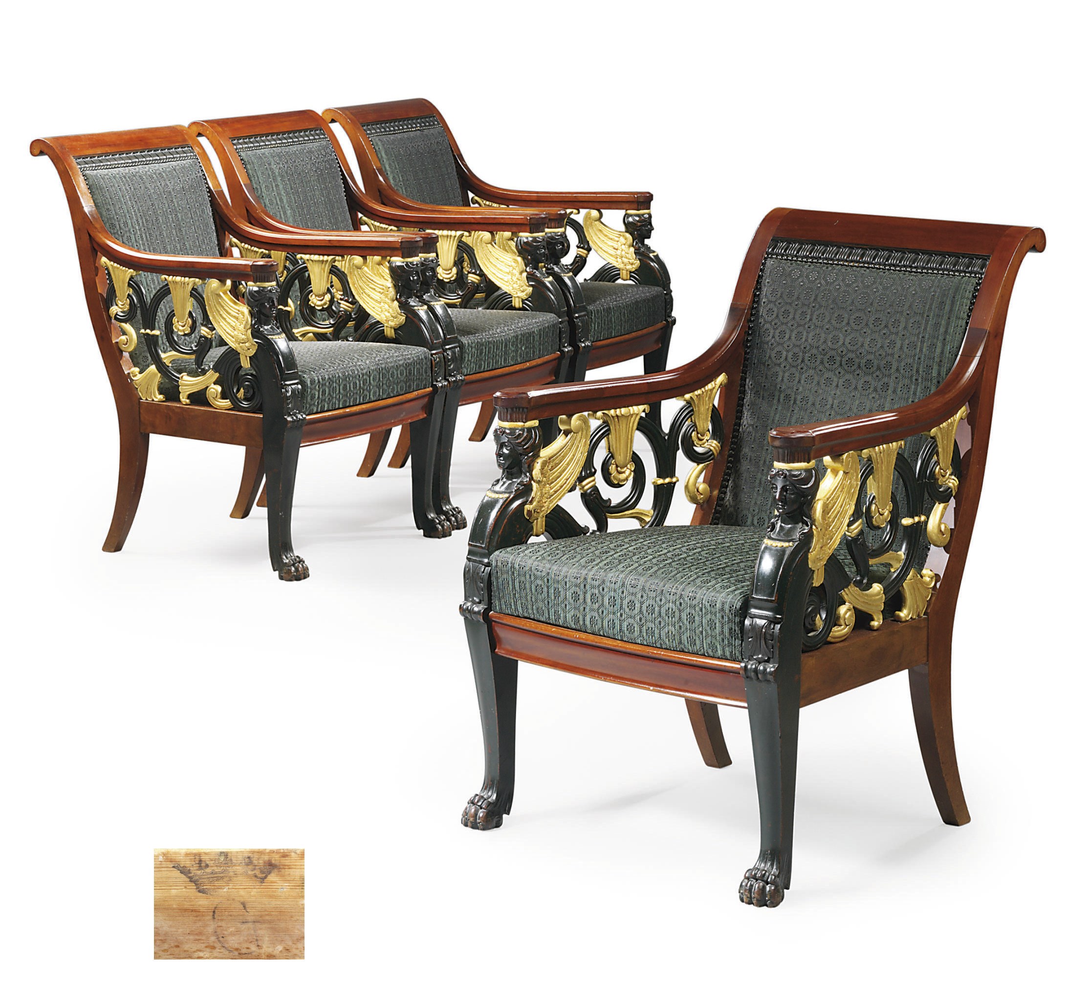 A SET OF FOUR RUSSIAN PARCEL-GILT AND BRONZED MAHOGANY OPEN ARMCHAIRS
