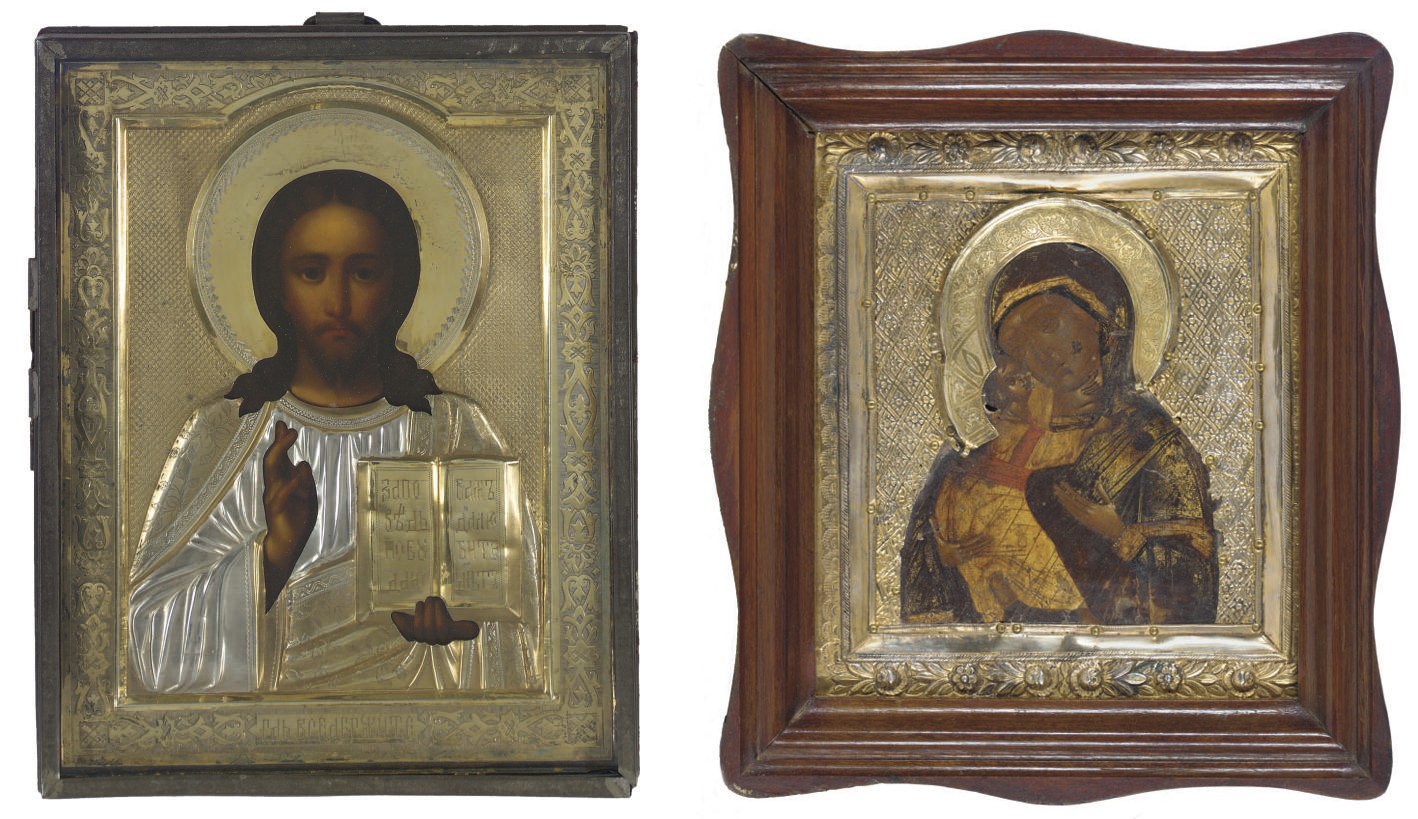 CHRIST PANTOKRATOR WITH A PARCEL-GILT OKLAD IN A GLAZED METAL KYOT AND AN ICON OF THE VLADIMIRSKAYA WITH A GILT AND SILVERED METAL OKLAD IN A GLAZED WOODEN KYOT