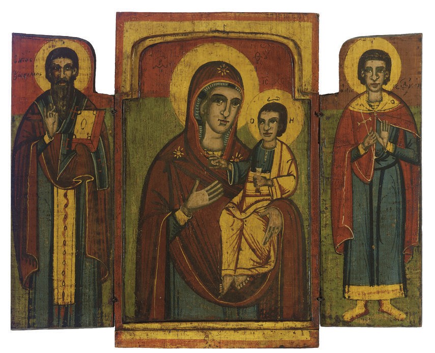 A TRIPTYCH WITH THE HODEGETRIA MOTHER OF GOD AND FAMILY PATRONS