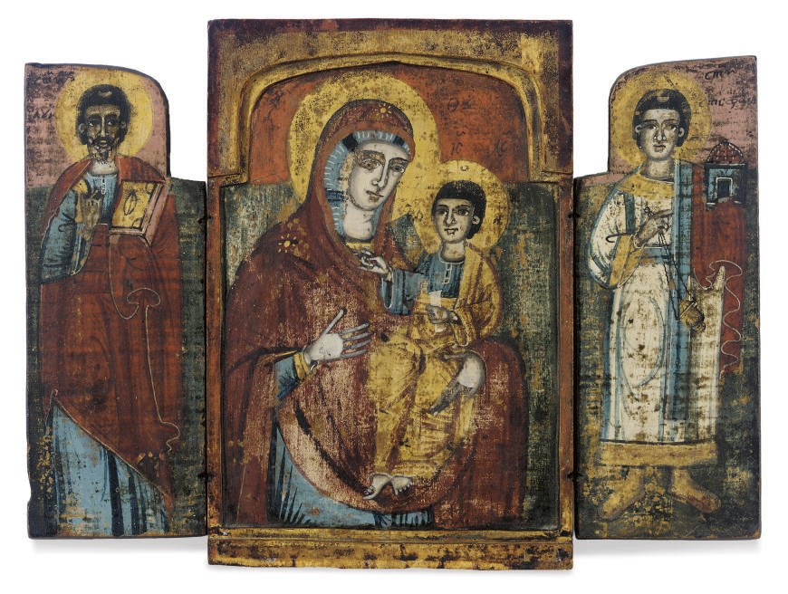 A TRIPTYCH WITH THE HODEGETRIA MOTHER OF GOD AND FAMILY PATRONS