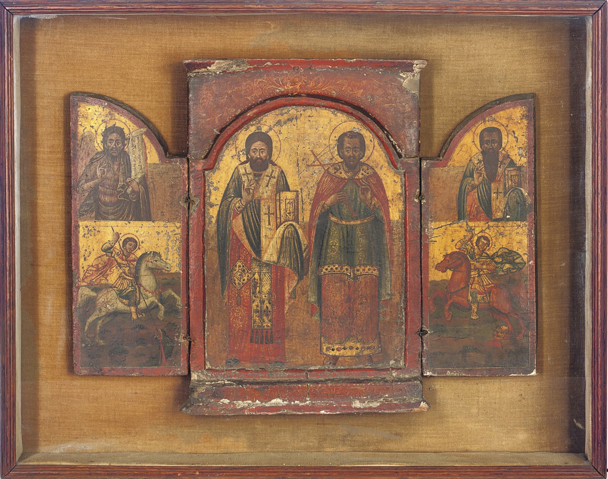 A TRIPTYCH WITH STS. KLEMES AND AGATHANGELOS IN THE CENTRE AND SELECTED FAMILY PATRONS TO EITHER SIDE, SET IN A LATER FRAME