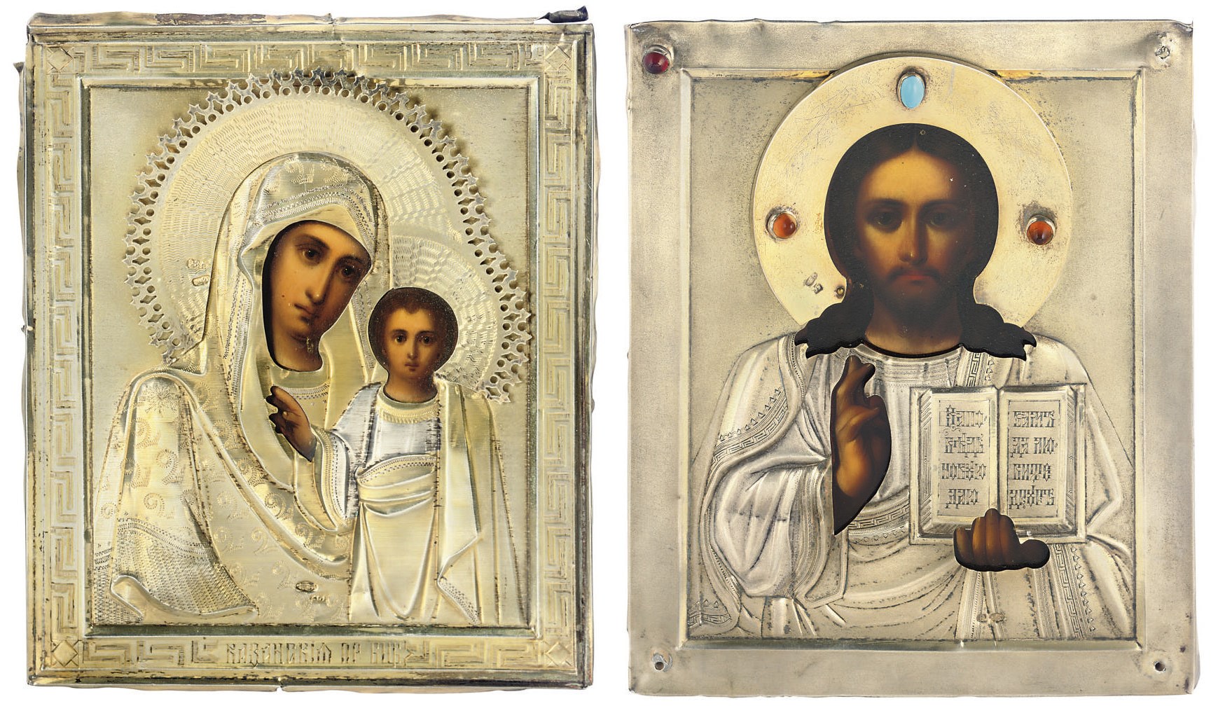 CHRIST PANTOKRATOR WITH A PARCEL-GILT OKLAD ORNAMENTED WITH GLASS CABACHONS AND AN ICON OF THE MOTHER OF GOD OF KAZAN WITH A PARCEL-GILT OKLAD