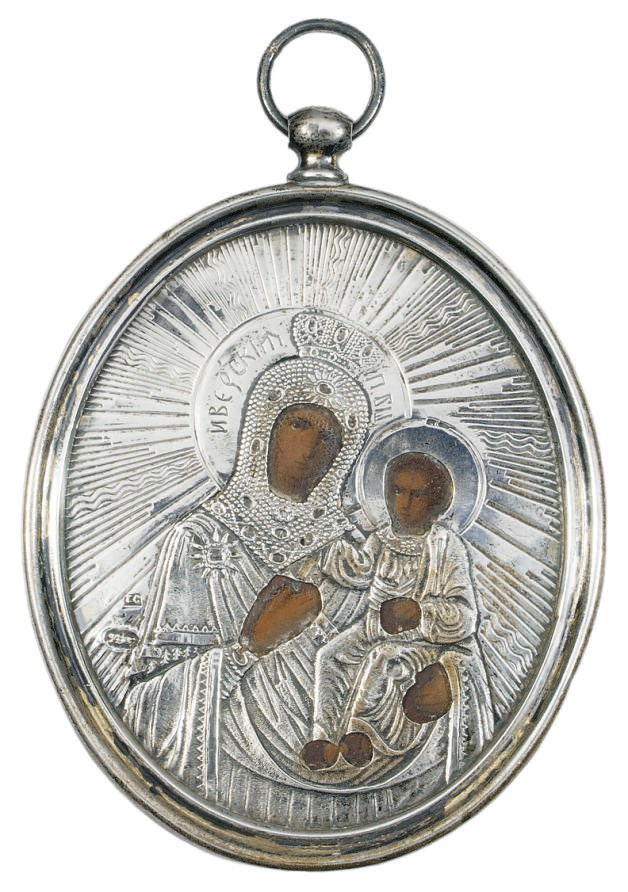 A MINIATURE ICON DEPICTING THE MOTHER OF GOD YVERSKAYA WITH A SILVER OKLAD