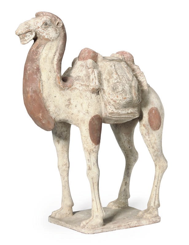 A CHINESE POTTERY CAMEL