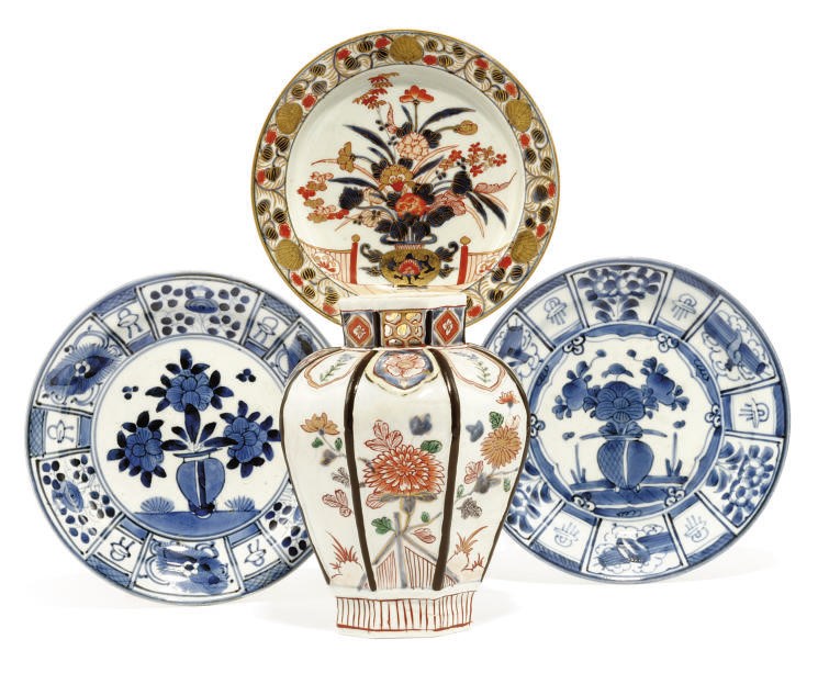AN IMARI VASE AND THREE DISHES