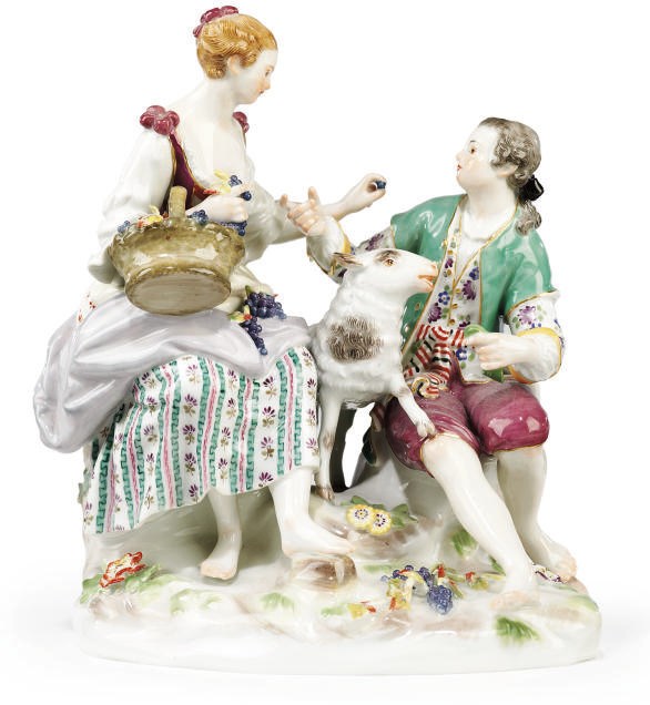 A MEISSEN GROUP OF A SHEPHERD AND SHEPHERDESS