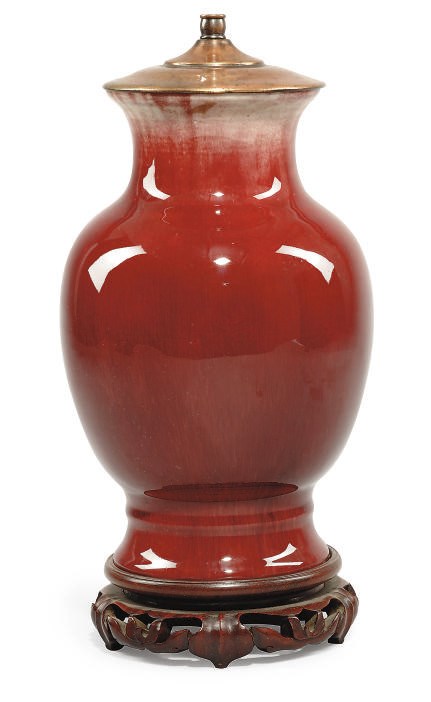 A CHINESE SANG-DE-BEOUF LAMPED BALUSTER VASE