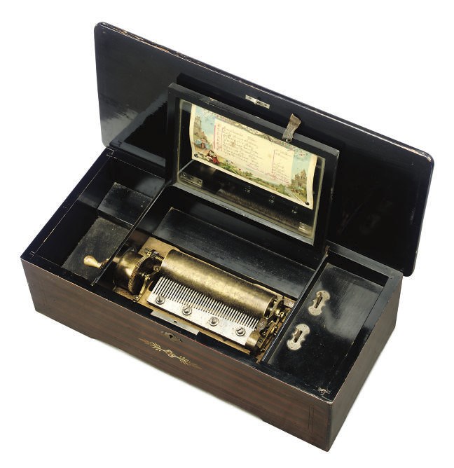 A SWISS ROSEWOOD AND MARQUERY CYLINDER MUSIC BOX