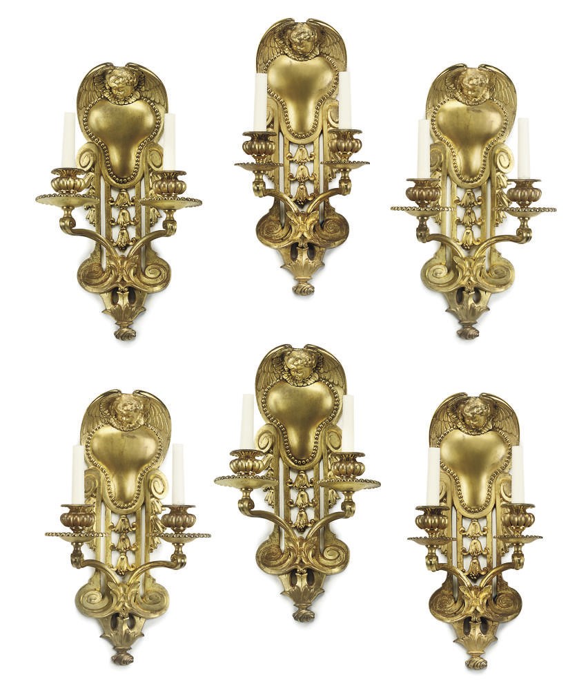 A SET OF SIX GILT-BRONZE TWIN-LIGHT WALL APPLIQUES