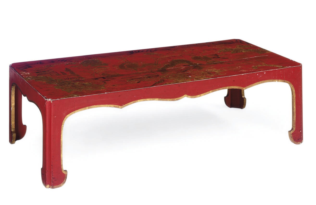 A CHINESE RED LACQUER AND PARCEL GILT COFFEE TABLE