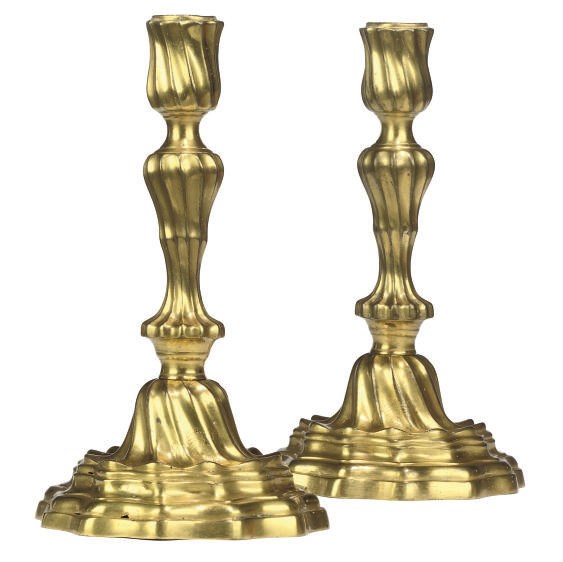 A PAIR OF LOUIS XVI ORMOLU CANDLESTICKS