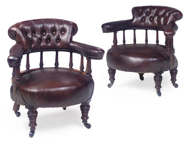 A PAIR OF LATE VICTORIAN LEATHER UPHOLSTERED TUB CHAIRS