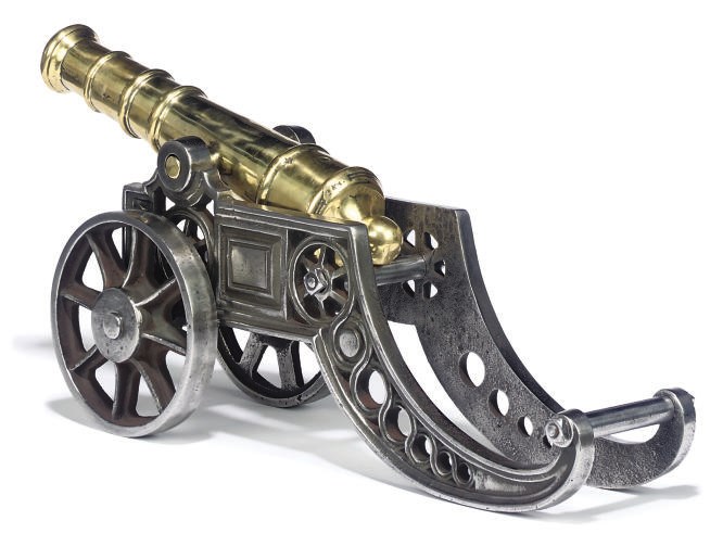 A STEEL AND BRASS MODEL OF A CANNON