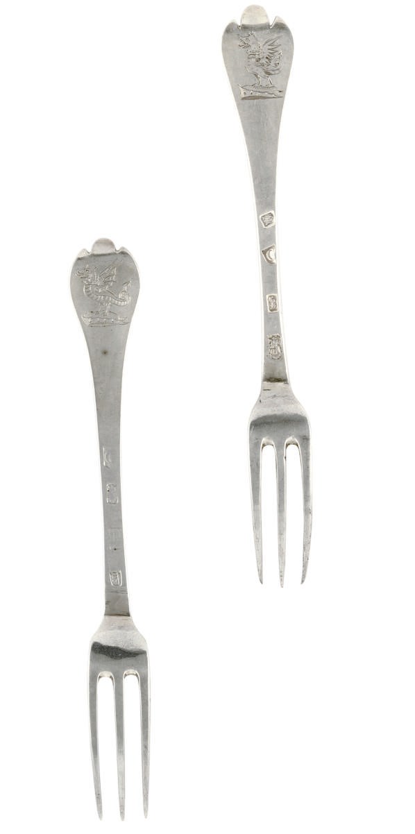 A MATCHED SET OF SIX GEORGE I THREE-PRONGED SILVER TREFID FORKS