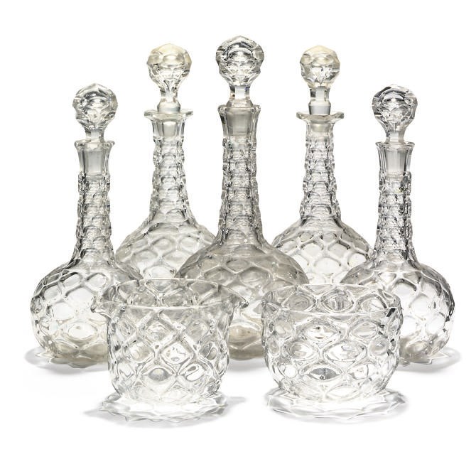 A SET OF VICTORIAN DECANTERS AND WINE RINSERS