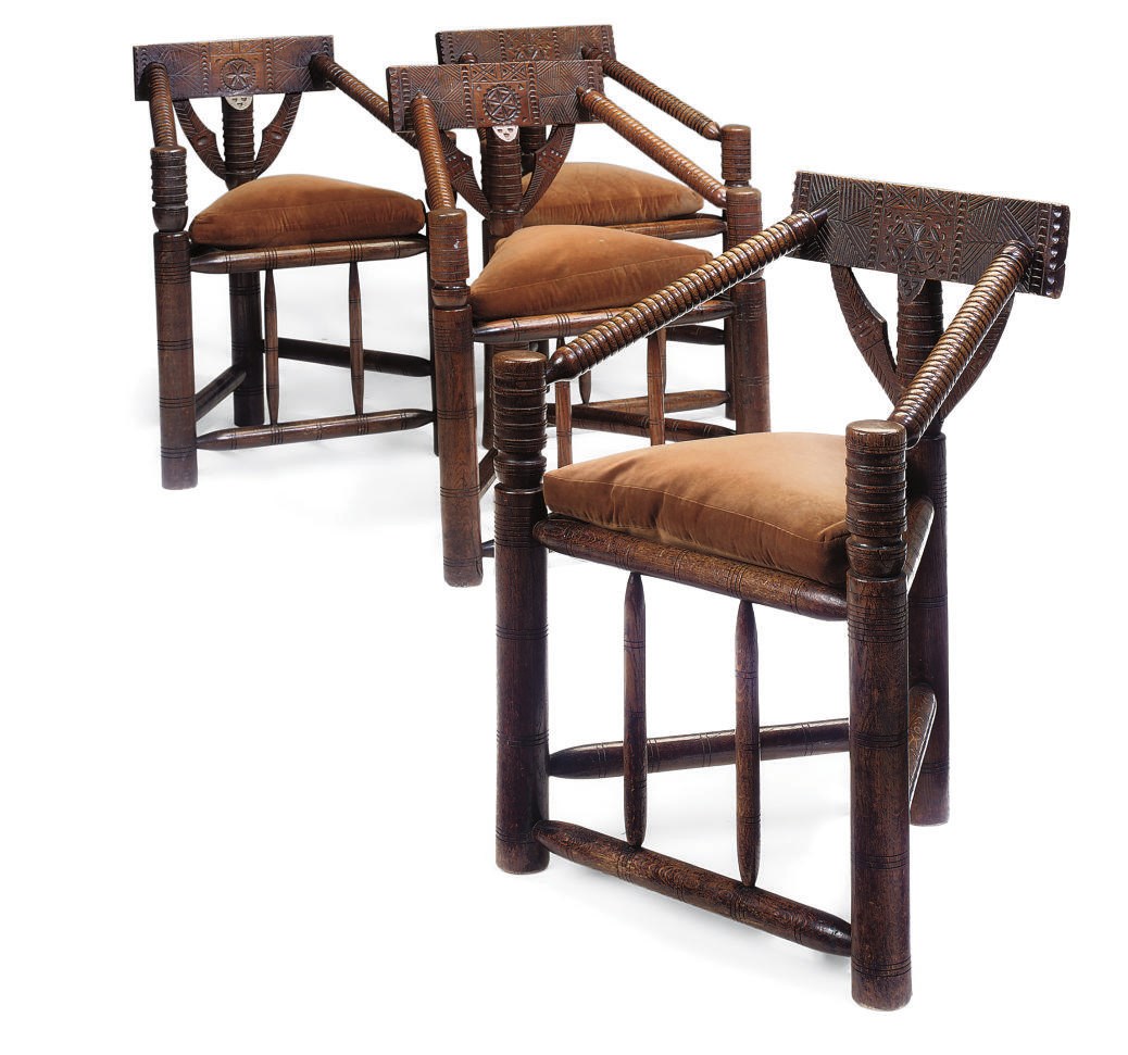 A SET OF FOUR IRISH OAK AND ASH TURNER'S CHAIRS