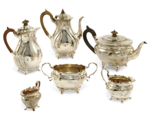 A LATE VICTORIAN SIX-PIECE SILVER TEA AND COFFEE SERVICE