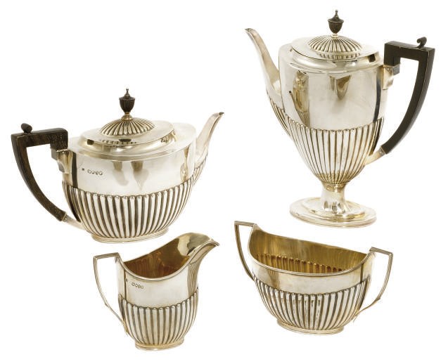 A LATE VICTORIAN FOUR-PIECE SILVER TEA AND COFFEE SERVICE