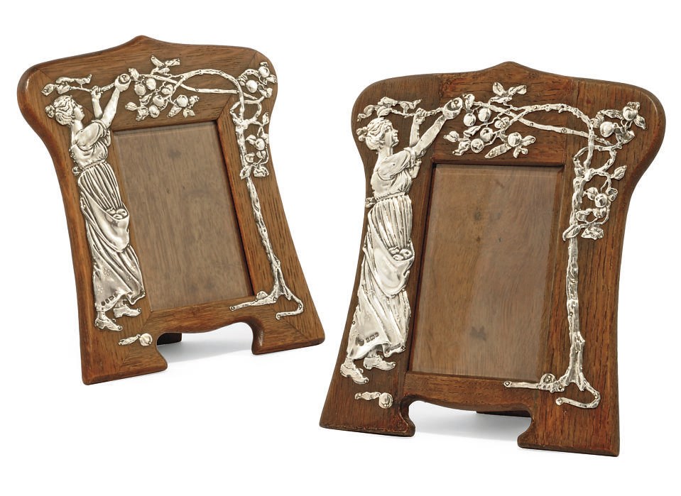 A PAIR OF EDWARDIAN ART NOUVEAU SILVER-MOUNTED PHOTOGRAPH FRAMES