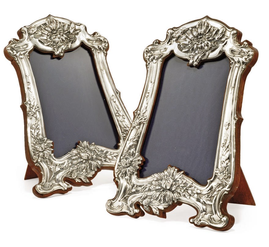 A PAIR OF EDWARDIAN SILVER-MOUNTED PHOTOGRAPH FRAMES