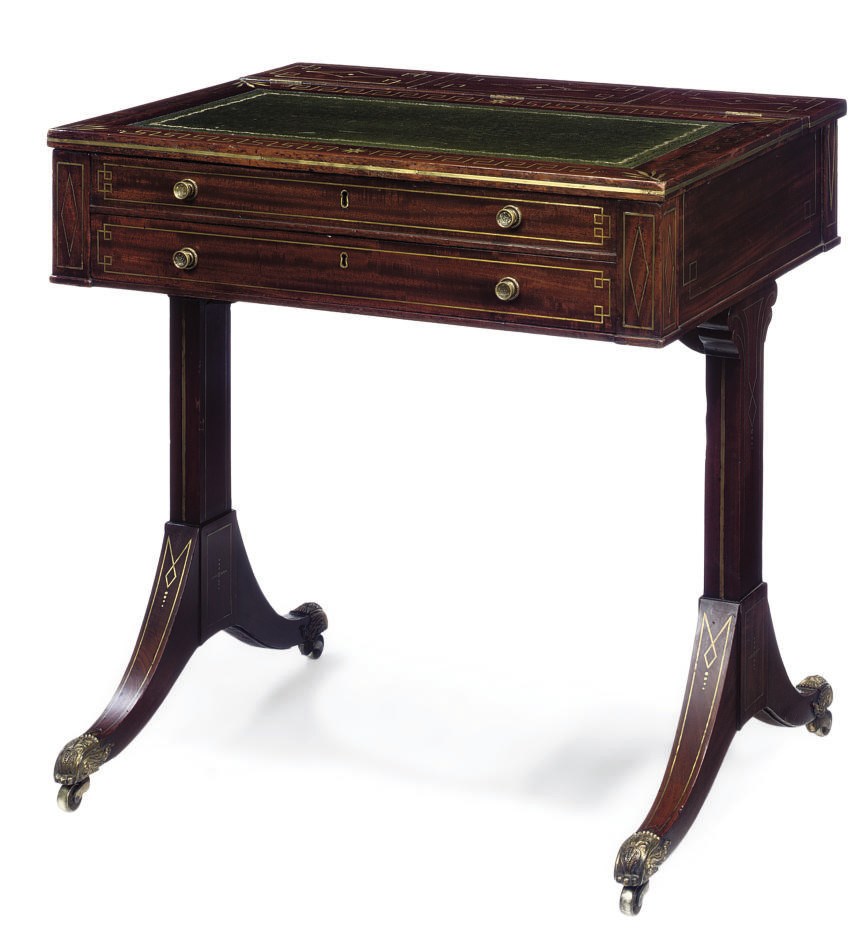 A REGENCY MAHOGANY AND LINE INLAID WRITING TABLE