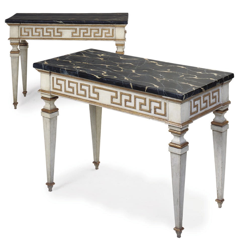 A PAIR OF ITALIAN CREAM AND GILT DECORATED CONSOLE TABLES