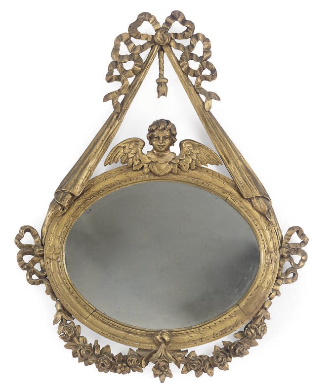 A FRENCH GILTWOOD AND COMPOSITION MIRROR