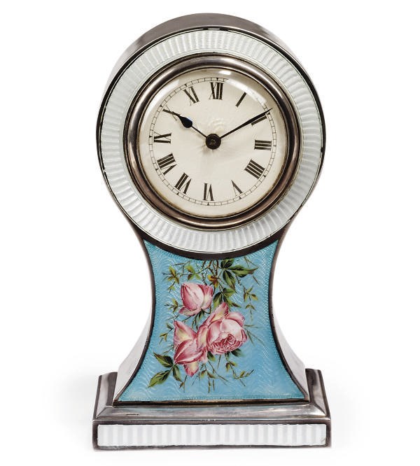 AN EDWARDIAN SILVER AND GUILLOCHÉ MANTEL TIMEPIECE