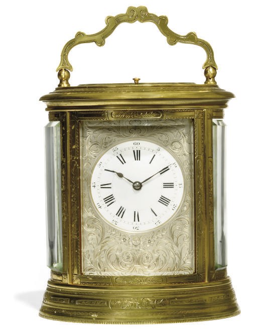 A FRENCH ENGRAVED BRASS STRIKING AND REPEATING EIGHT DAY OVAL CARRIAGE CLOCK