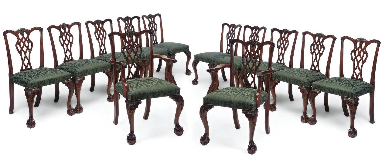 A SET OF TWELVE MAHOGANY DINING CHAIRS