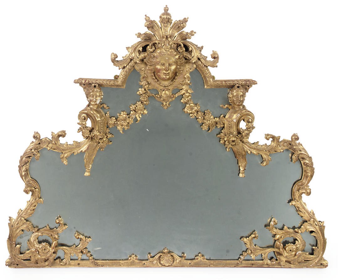 A FRENCH CARVED GILTWOOD MIRROR