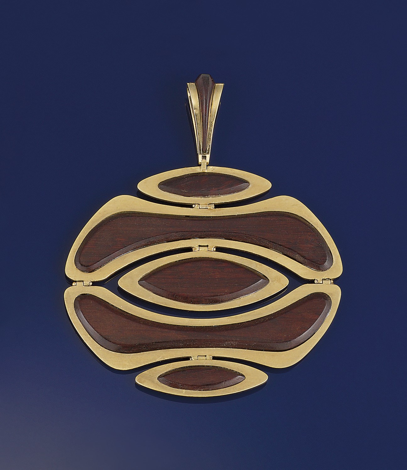 A rosewood pendant, by Van Cleef & Arpels