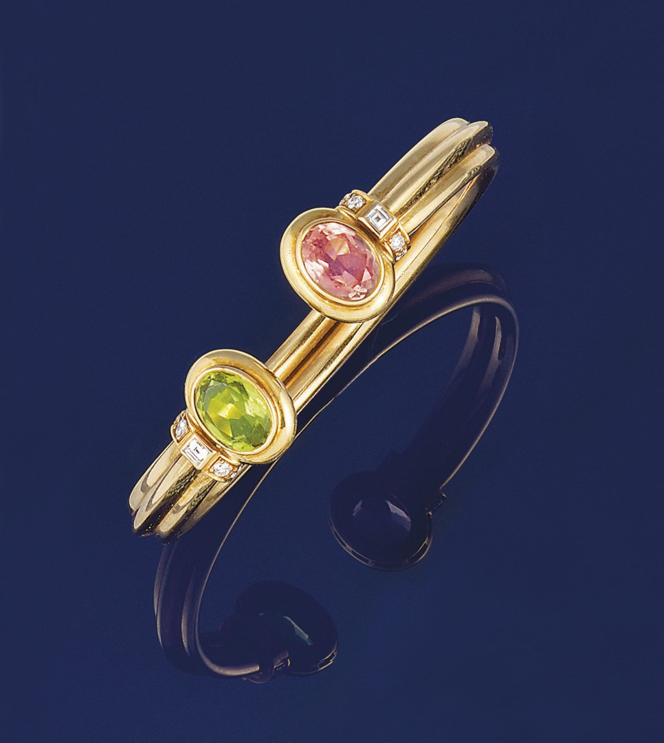 A peridot and tourmaline bangle by Bulgari