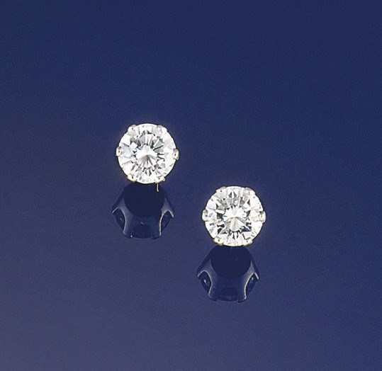 A pair of diamond single stone earstuds