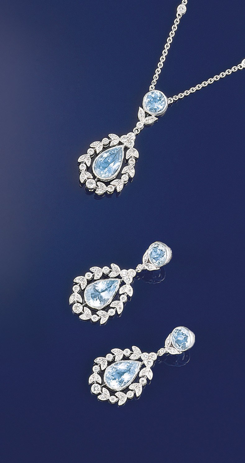 An aquamarine and diamond necklace and earpendants