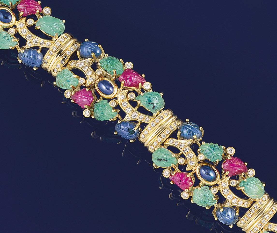 A diamond and gem bracelet