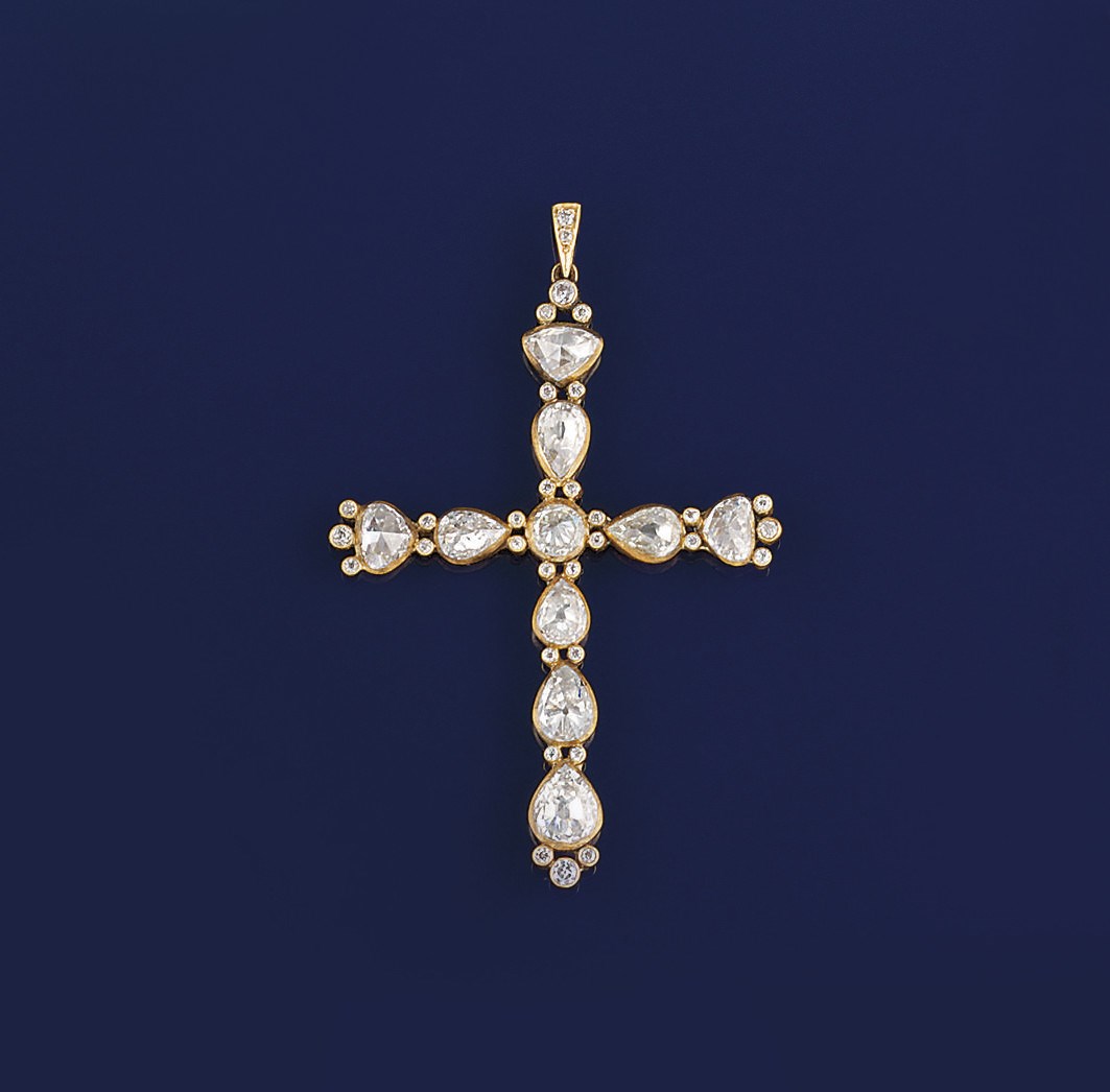A diamond cross pendant