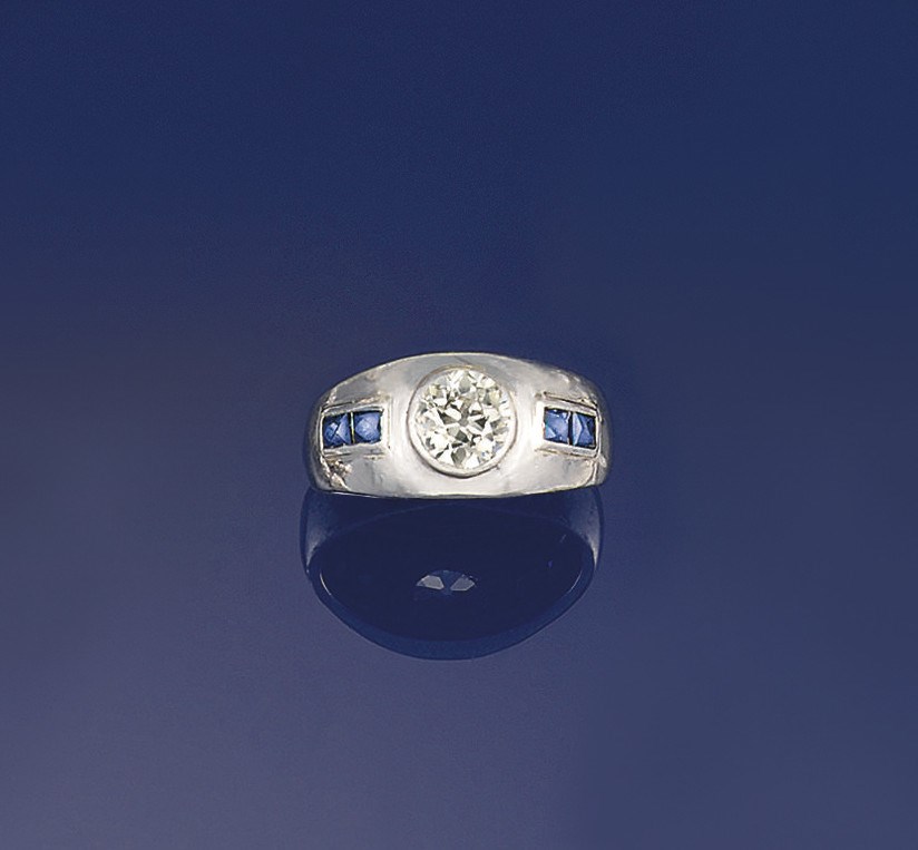 A diamond and sapphire ring