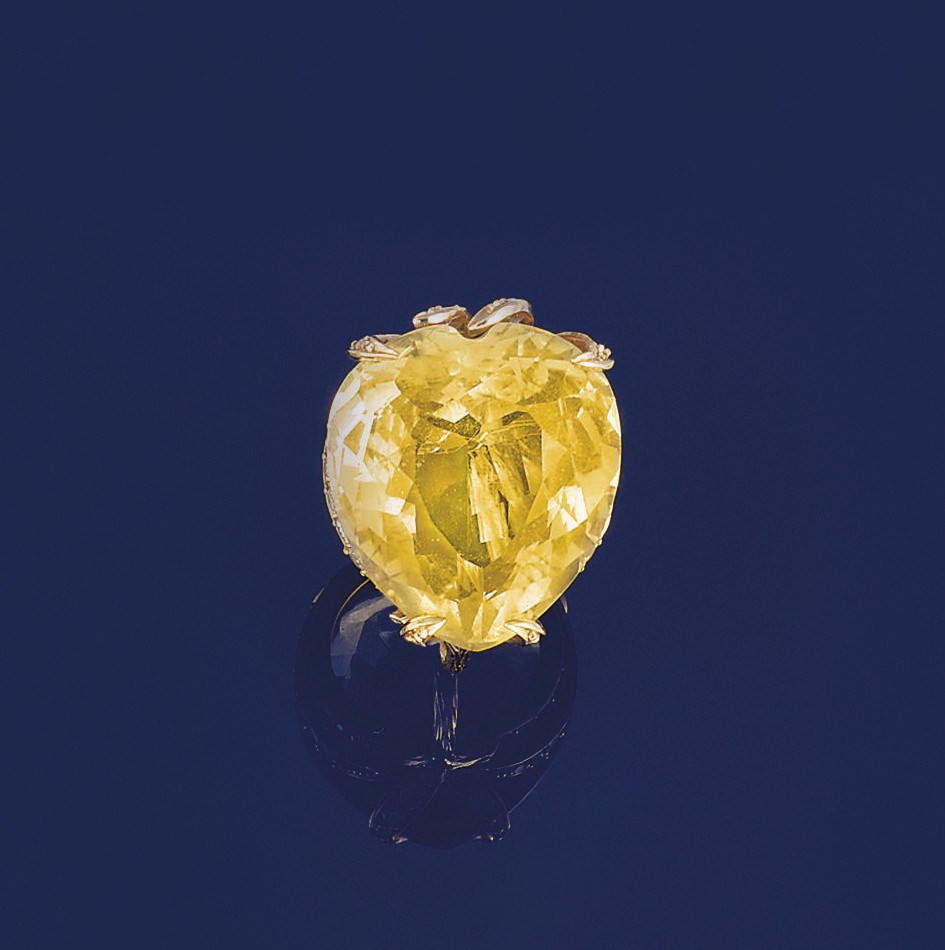A citrine and diamond ring