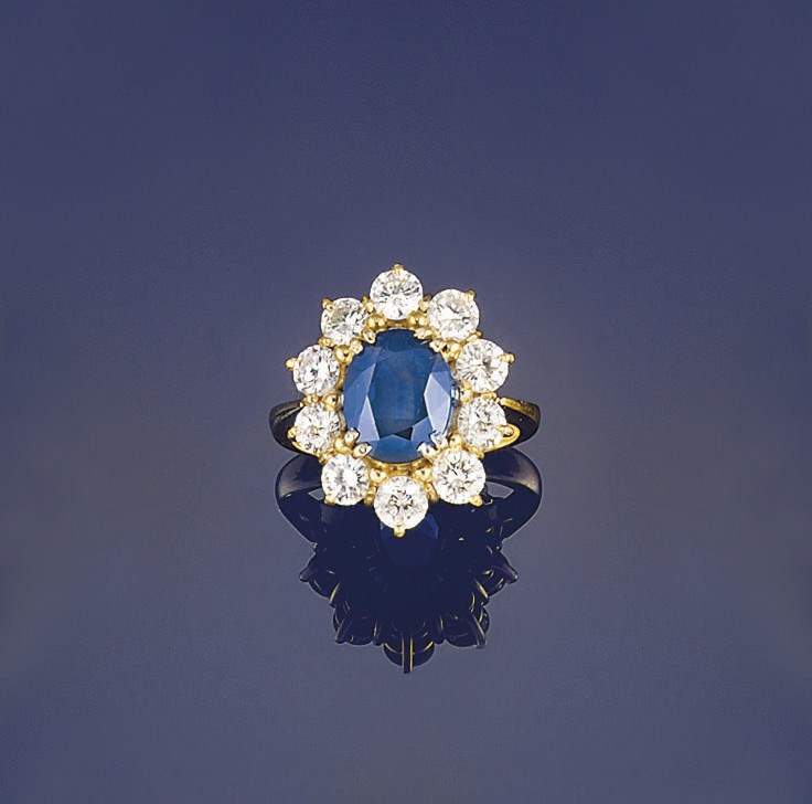 A sapphire and diamond cluster ring