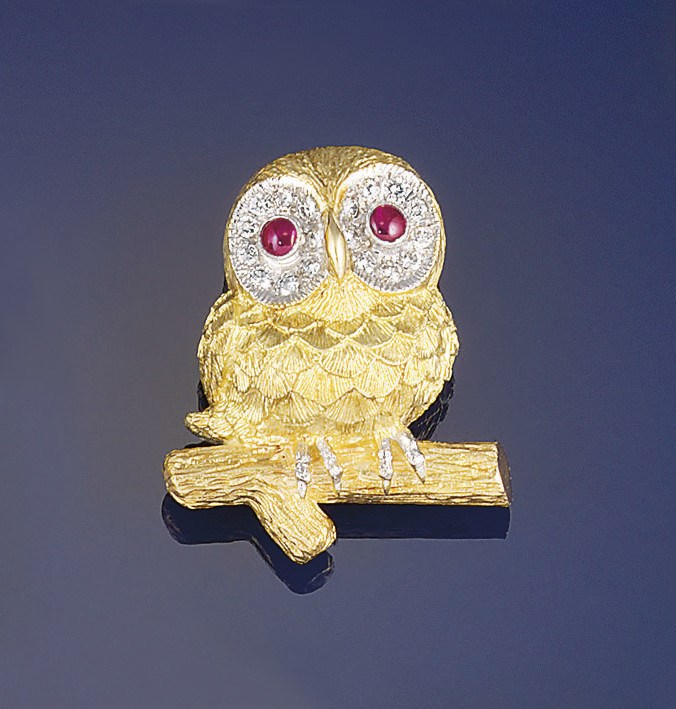 An 18ct gold, diamond and ruby novelty brooch