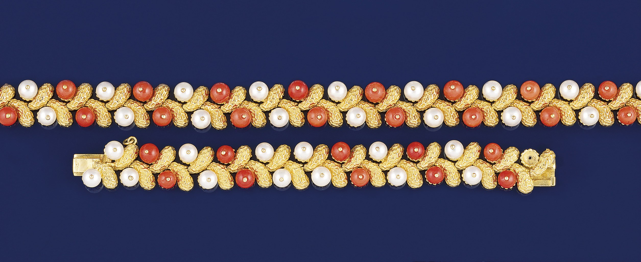 A suite of coral and cultured pearl jewellery