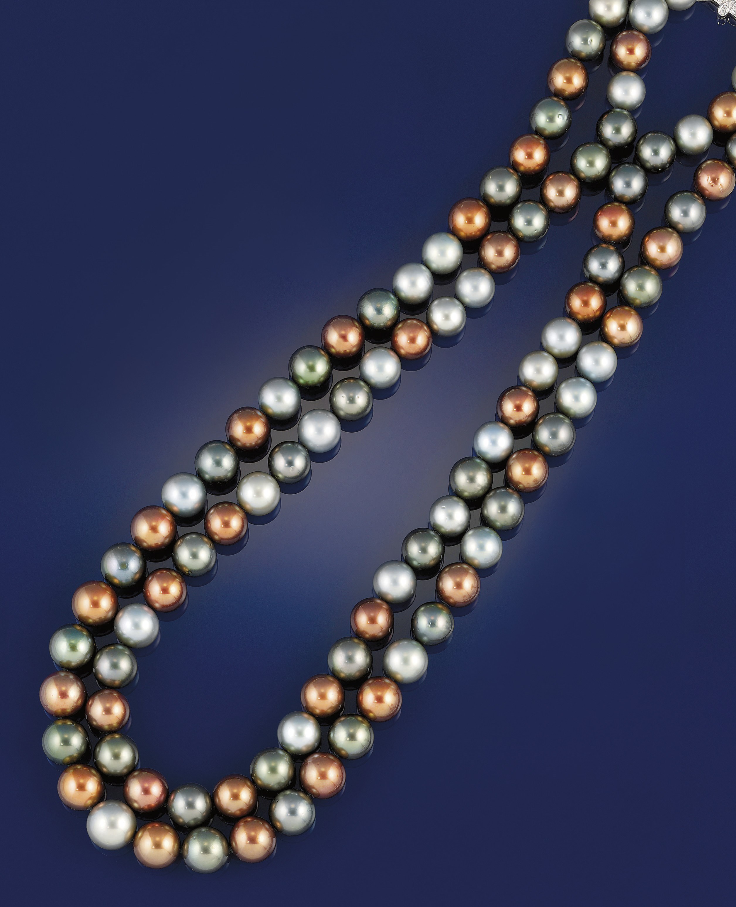 A vari-coloured cultured pearl and diamond necklace