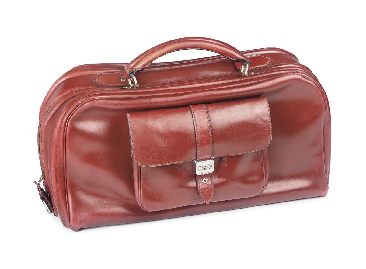 AN OXBLOOD-RED 'V' BAG