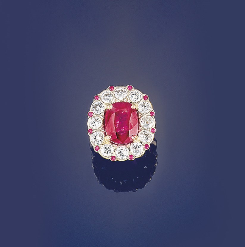 A ruby and diamond cluster ring