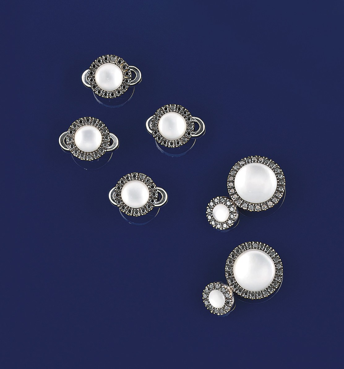 A coloured diamond and rock crystal dress-set