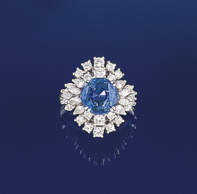 A sapphire and diamond cluster ring